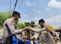 TNI-Polri Peduli, Polres Lampung Utara Bersama Kodim 0412 Bagikan Air Bersih Kepada Warga