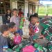 Peduli Kesehatan Warga di Perbatasan RI-PNG, Satgas Yonif 131/BRS Beri Pengobatan Gratis Kepada Warga
