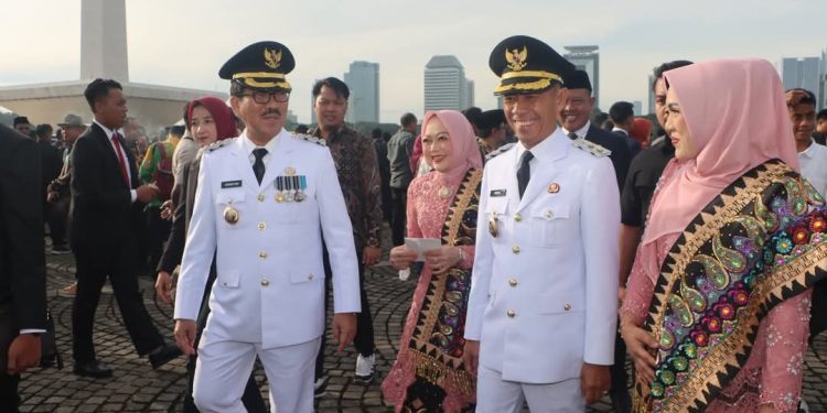 Presiden RI Lantik Dr. Ir. H. Hamartoni Ahadis, M.Si., dan Romli.,S.kom.,S.H.,M.H. Sebagai Bupati Dan Wakil Bupati Lampura Terpilih Periode 2025-2030 Di Istana Negara