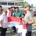 Wakil Bupati Pesisir Barat Bagikan Bendara Merah Putih