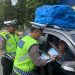 Personel Pos Pelayanan Ops Ketupat Krakatau 2026 Polres Lampung Utara Atur Arus Mudik, Imbau Pemudik Utamakan Keselamatan