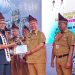 Dapat Penghargaan Saat Musrenbang, Program “AKU LULUS” Disdukcapil Tanggamus Percontohan Se-Lampung