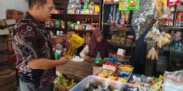 Satgas Pangan Polres Lampung Utara Cek Harga Minyak Kita di Pasar Candimas